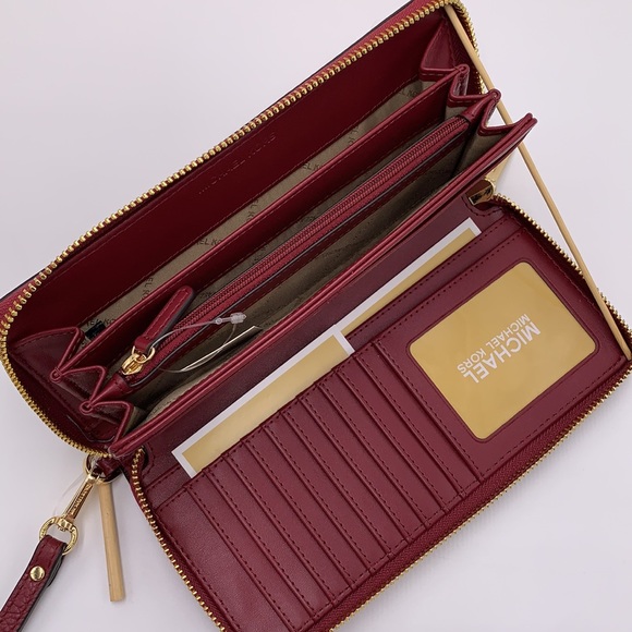 MICHAEL KORS
Leather Continental Wristlet Phone Case Wallet 
Oxblood 
NWT - Picture 3 of 16